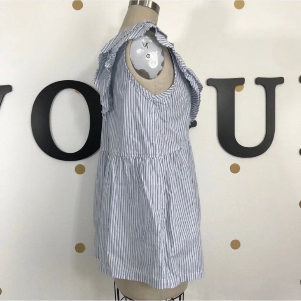 Left of Center M top size M